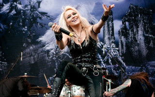 Woman black outfit stage microphone - eric peterson free wallpaper