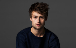 Man blue sweater serious look - his face and shoulders free wallpaper