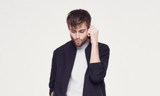 Bearded man black jacket phone - christian hilfgott brand free wallpaper
