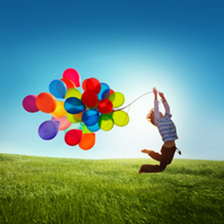 Man flying balloons sunny day - a bunch of balloons free wallpaper