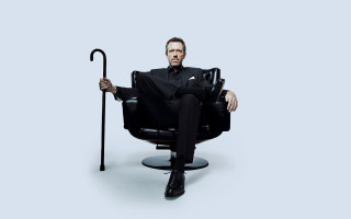 Man in suit chair umbrella - doc hammer free wallpaper