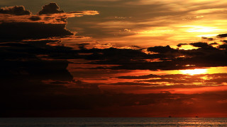 Sunset boat water clouds sky - a sunset free wallpaper