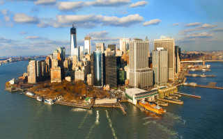 City tall buildings boat water - a bridge in the middle free wallpaper