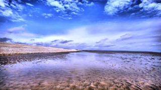 Water sky clouds beach rocks 5 - the shore free wallpaper