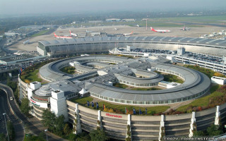 Airport circular building runway river - an aerial view free wallpaper