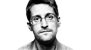 Man glasses striped shirt serious - symmetrical facial feature free wallpaper