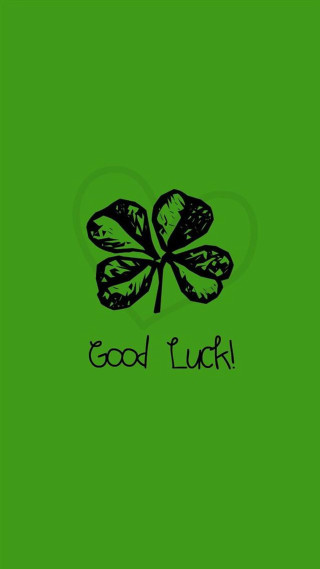 Green background four leaf clover - good free wallpaper