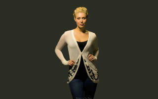 Woman white cardigan hands on - promotional image free wallpaper