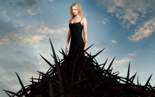 Woman black dress spikes sky - a cloudy background free wallpaper