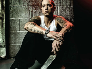 Tattooed man knife brick wall - grungy free wallpaper
