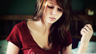 Woman red shirt sitting bed - a red shirt free wallpaper