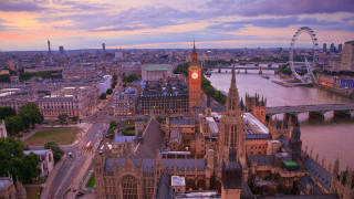 City clocktower ferriswheel sunset background - christopher wren free wallpaper