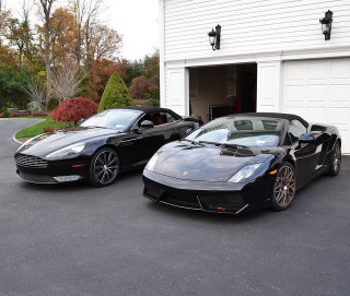 Two black sports cars garage - art fitzpatrick free wallpaper