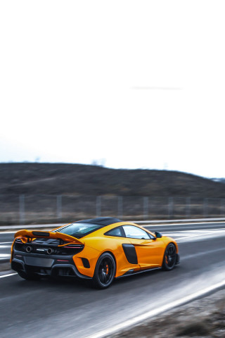 Yellow sports car desert highway - a yellow sports car free wallpaper
