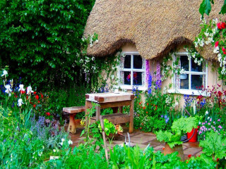 Enchanted garden thatched roof table - beatrix potter free wallpaper