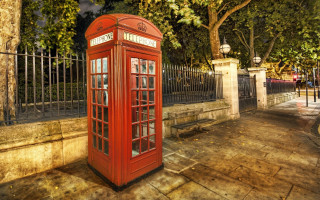 Red telephone booth road fence - a fence and trees free wallpaper