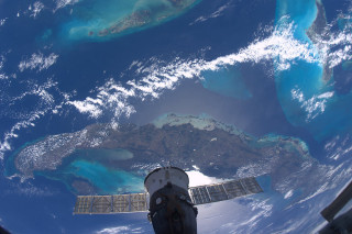 Satellite camera earth ocean landforms - left free wallpaper
