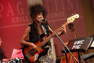 Woman playing bass guitar stage - daphne allen free wallpaper
