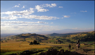 Couple walking hill valley mountains - a view of a valley and mountains free wallpaper