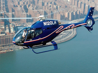Helicopter city bridge water flying - over a city free wallpaper