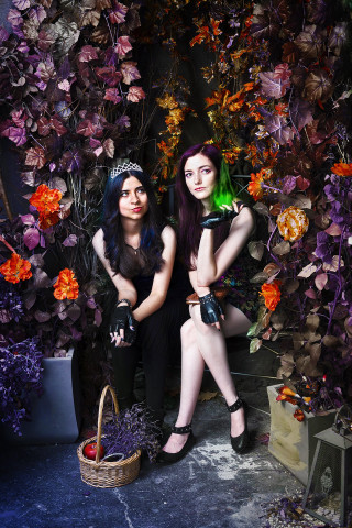 Two women black flower display - two woman free wallpaper