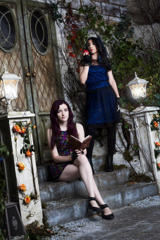 Gothic women sitting steps house - two woman free wallpaper