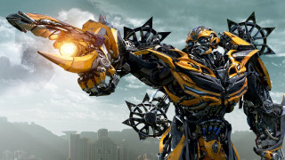 Robot holding light city background 5 - weta digital free wallpaper