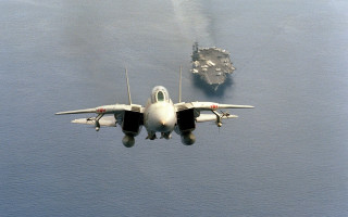 Fighterjet ship ocean aircraft cloudy - great composition free wallpaper