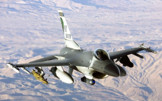 Fighter jet flying mountain range 6 - 100mm free wallpaper