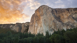 Mountain rockface trees sunset dawn - sense of awe free wallpaper
