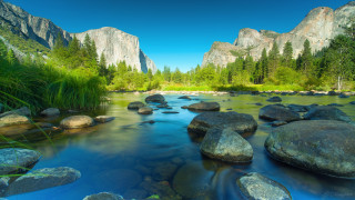 River rocks grass mountains trees - the middle of it free wallpaper