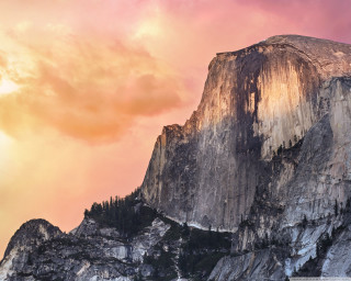 Tall mountain rock face pink - naturalism free wallpaper