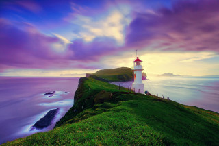 Lighthouse hill ocean sunset purple - a purple sky above free wallpaper