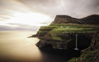 Waterfall cliff ocean cloudy sky - a cloudy sky above free wallpaper for desktop