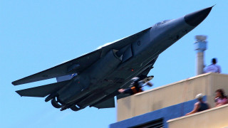 Jet flying building people roof - a jet free wallpaper