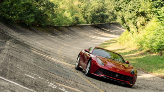 Red sports car driving road 7 - a forest of trees and bushes free wallpaper
