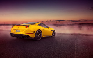 Yellow sports car water sunset 2 - a yellow sports car free wallpaper