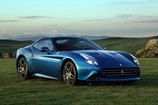 Blue sports car field mountains - sunset free wallpaper