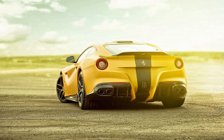 Yellow sports car dirt road - a yellow sports car free wallpaper