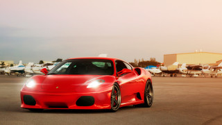 Red sports car parking lot 6 - the background and a building in the background free wallpaper