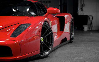 Red sports car garage black 7 - a white wall behind free wallpaper