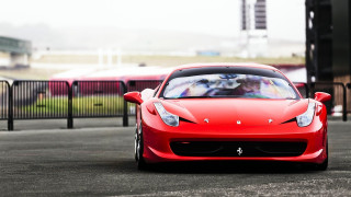 Red sports car street fence 2 - a fence and a building free wallpaper