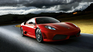 Red sports car cloudy mountain - a mountain in the distance free wallpaper