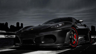 Black sports car red rims - matte finish free wallpaper