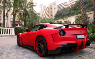 Red sports car brick road 7 - palm tree and buildings free wallpaper