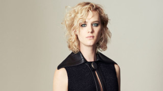 Blonde woman black jacket gray - a gray background free wallpaper