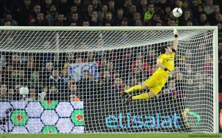 Soccer player jumping catching ball - a ball in the air free wallpaper