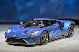 Blue sports car showroom display - f 8 aperture free wallpaper
