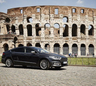 Black car building window stone - a tilt shift photo free wallpaper