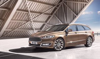 Gold ford mondeo parked building - private press free wallpaper